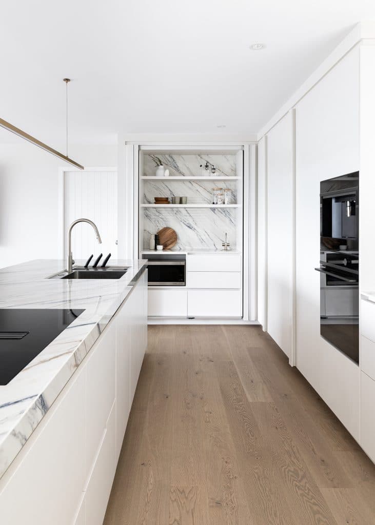Empire Oak wood flooring mid colour brown timber in galley kitchen MARAETAI_Kitchen