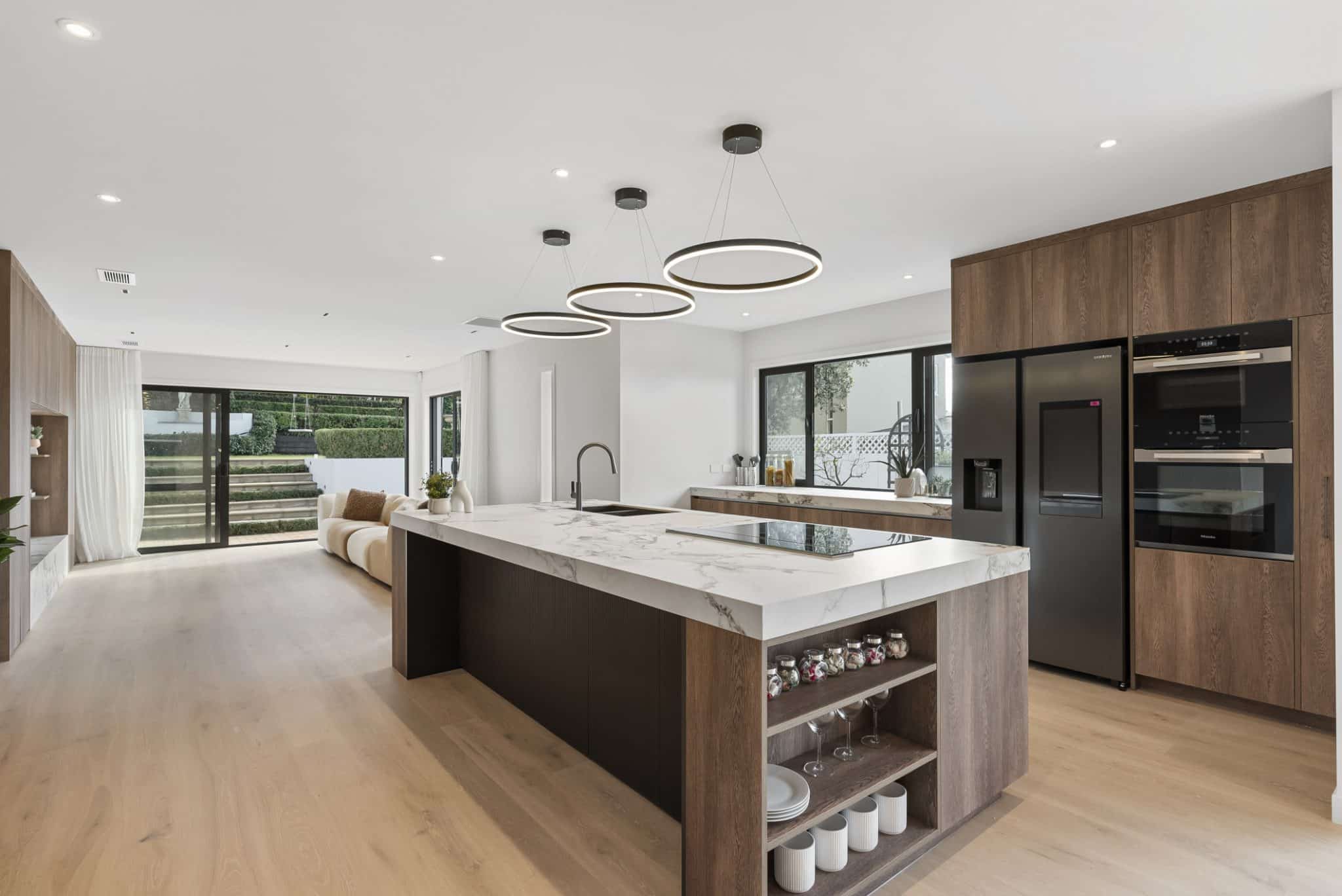 Spacious Open Plan Kitchen with European wood flooring