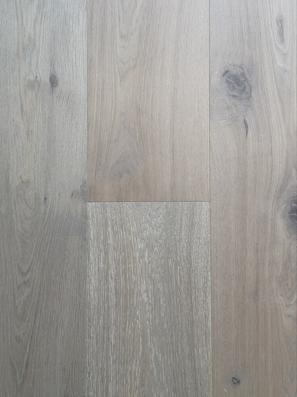 Wide plank oak hardwood flooring with smoked finish in mid brown tone. Chateau Collection. Margaux