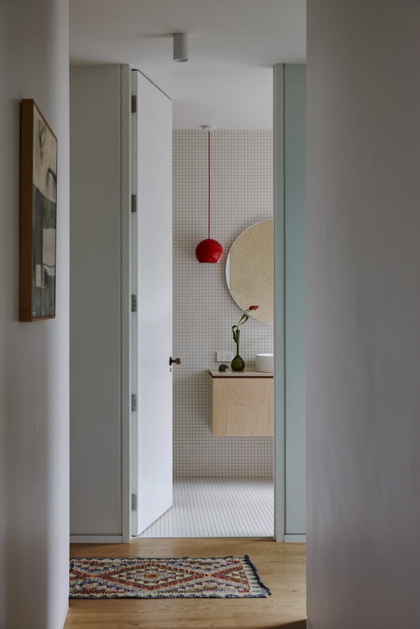 White oak hardwood flooring in open plan living dining with timber ceilings and a view