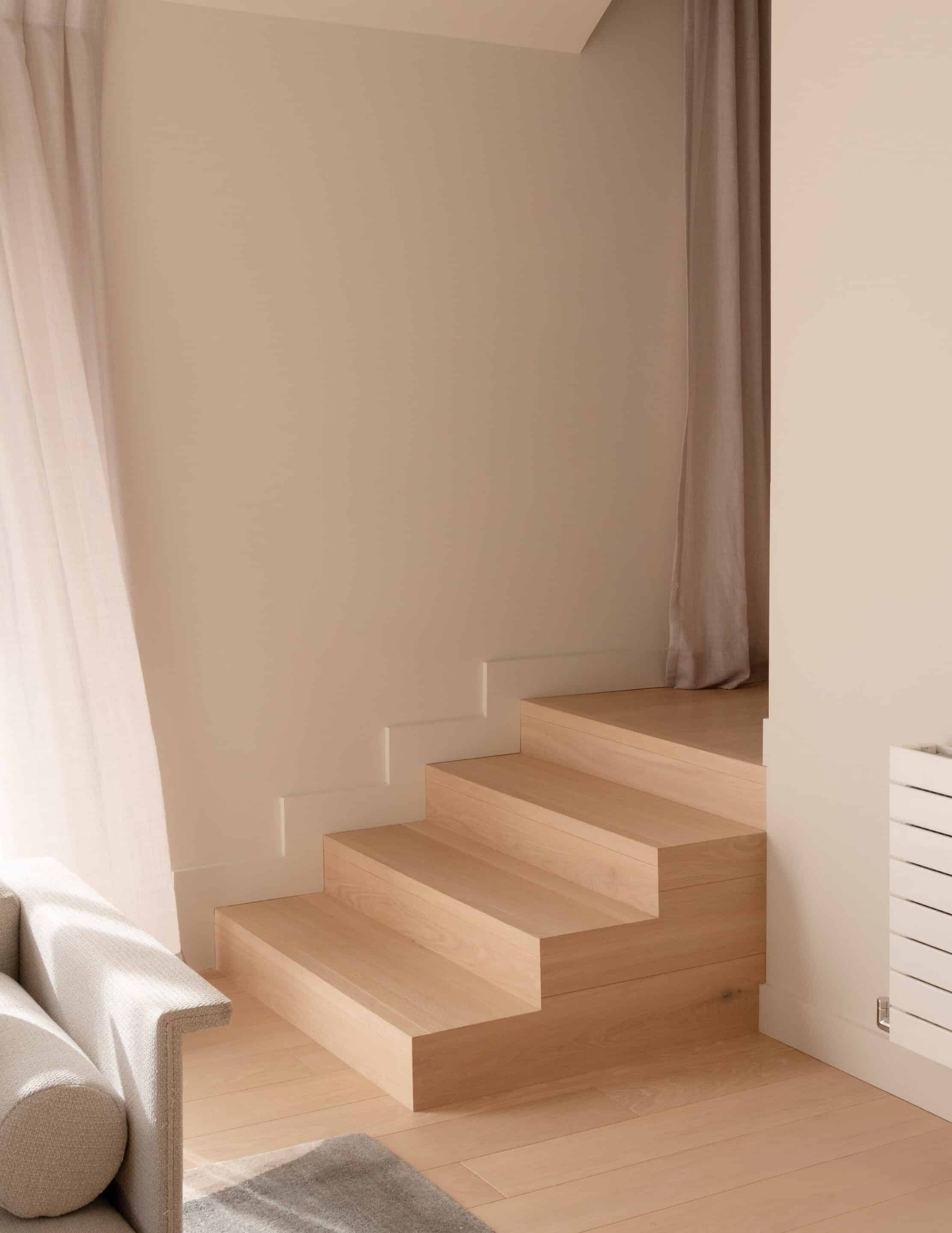 Greenbelt House Stairs, showcasing Vienna Woods Sazerac Prime Grade Wood Flooring